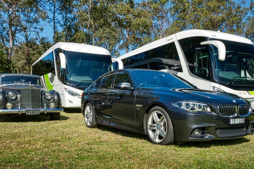 Picture of a few of Lonestars coaches and vehicles ready for use in charters on the Gold Coast